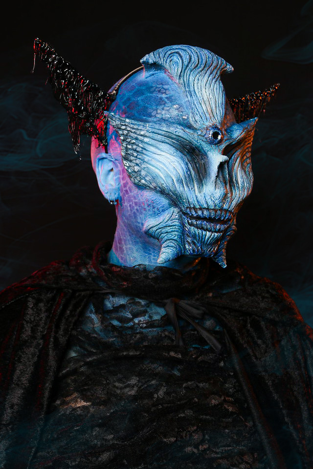 Three-quarter portrait of Alien Butterfly 1.0 showing its layered surfaces and lateral details.