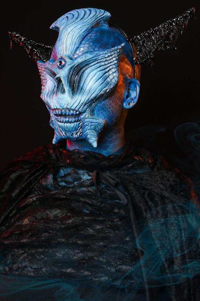 Side portrait of the blue-and-silver Alien Butterfly 1.0 silicone prosthetic character.